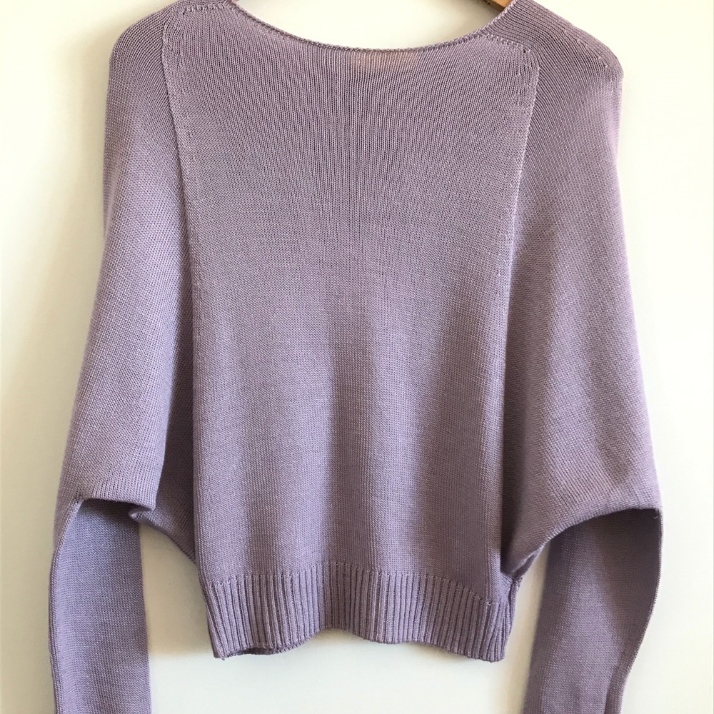 It’s weird but fun! This knit top is interesting